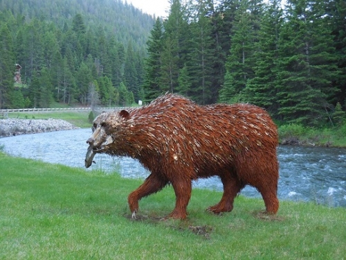 Image of "Grizzly Gone Fishing" sculpture by Jim Dolan