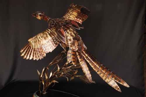 Image of a pheasant sculpture by Jim Dolan