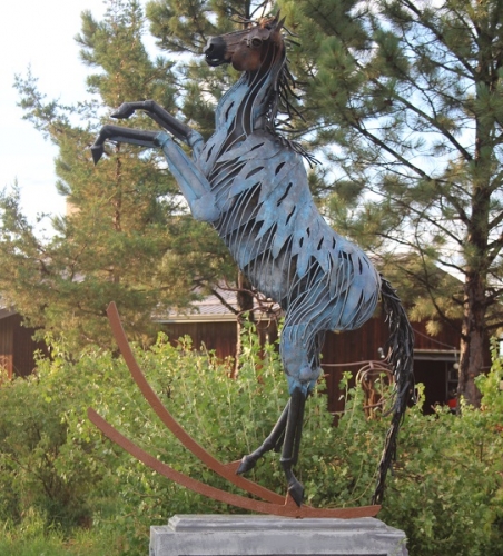 Featured image of "Rocking Free" sculpture by Jim Dolan
