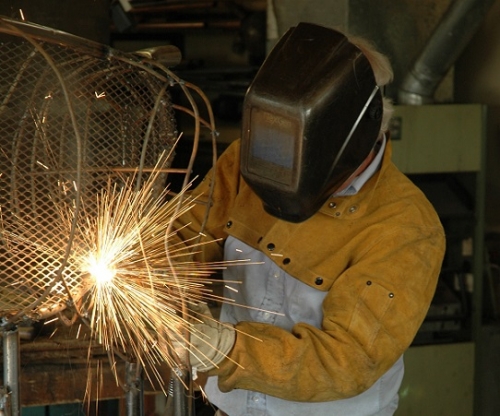 Image of Jim Dolan welding in studio