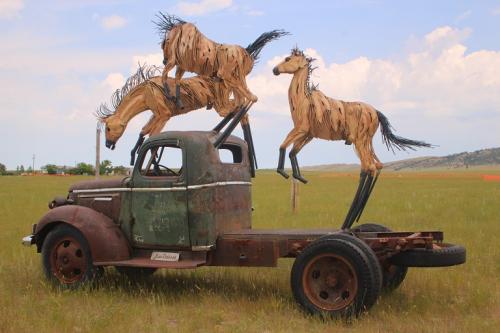 Featured image of "Three Buck Truck" sculpture by Jim Dolan