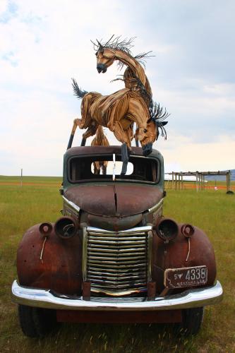 Featured image of "Three Buck Truck" sculpture by Jim Dolan