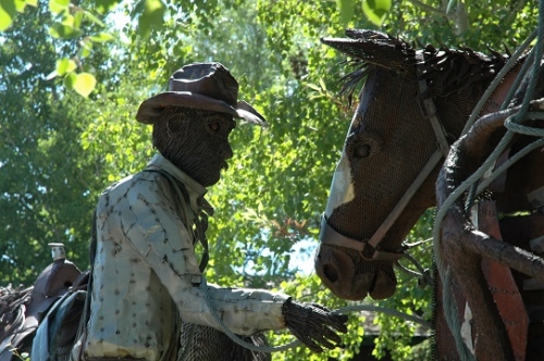Image of cowboy and horse in "Wreck Waiting to Happen" sculpture by Jim Dolan