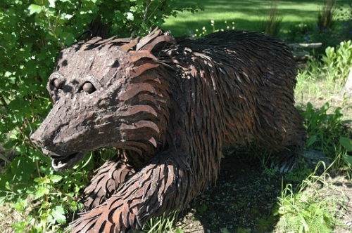 Image of bear cub in "Wreck Waiting to Happen" sculpture by Jim Dolan
